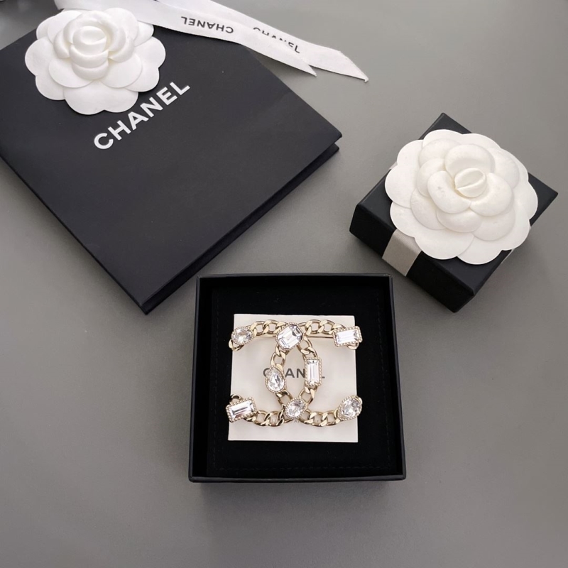 Ch*el brooches